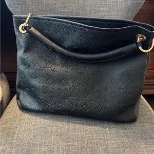 **LARGE***.   1:1 REAL Leather handbag. Small flaw on clasp.